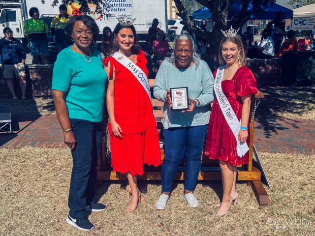 The event was a chili cook-off, where contestants competed to make the best chili. During the event, Miss Camden Teen and the queen were present, perhaps as special guests or participants. Someone took a picture of a man receiving an award, possibly for winning the chili cook-off or for another achievement related to the event.